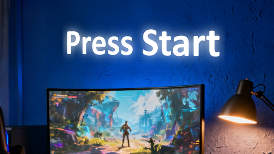 Gaming setup with 'Press Start' text on a blue wall - Illuminated Letters from Vibewall