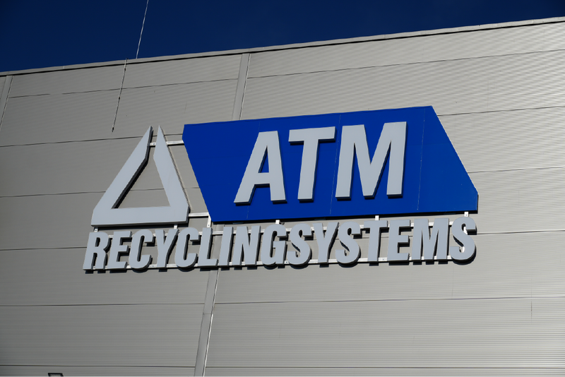 ATM Recycling Systems logo on a building facade