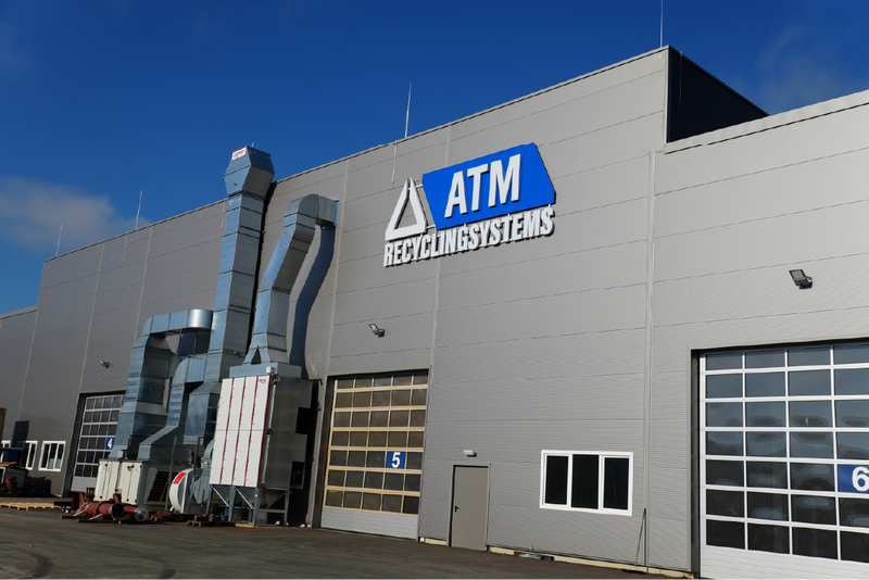 ATM Recycling Systems logo sign on the building.
