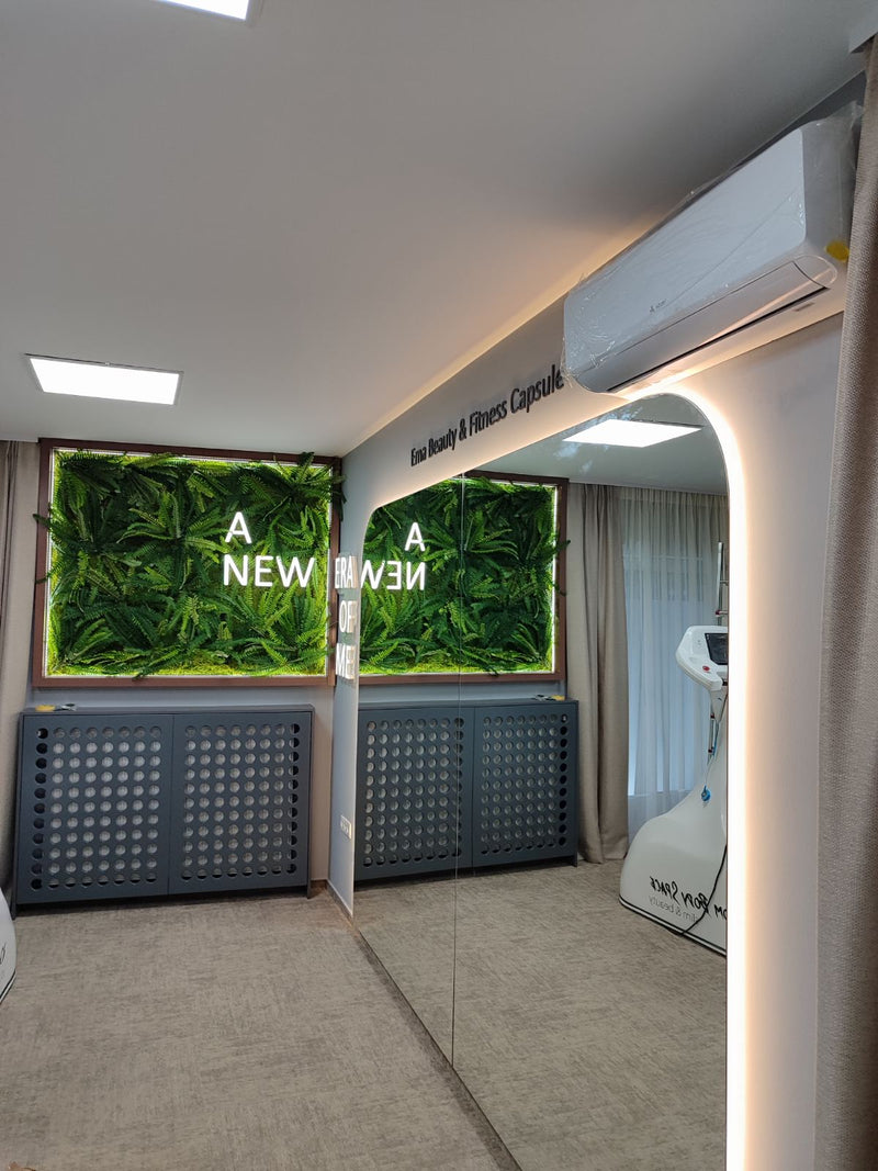Modern interior with our green wall unit and lite up letters , and also with black  acrylic letters on other wall.