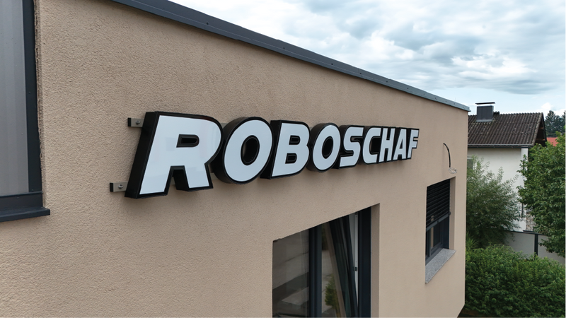 Roboschaf sign on a building exterior.