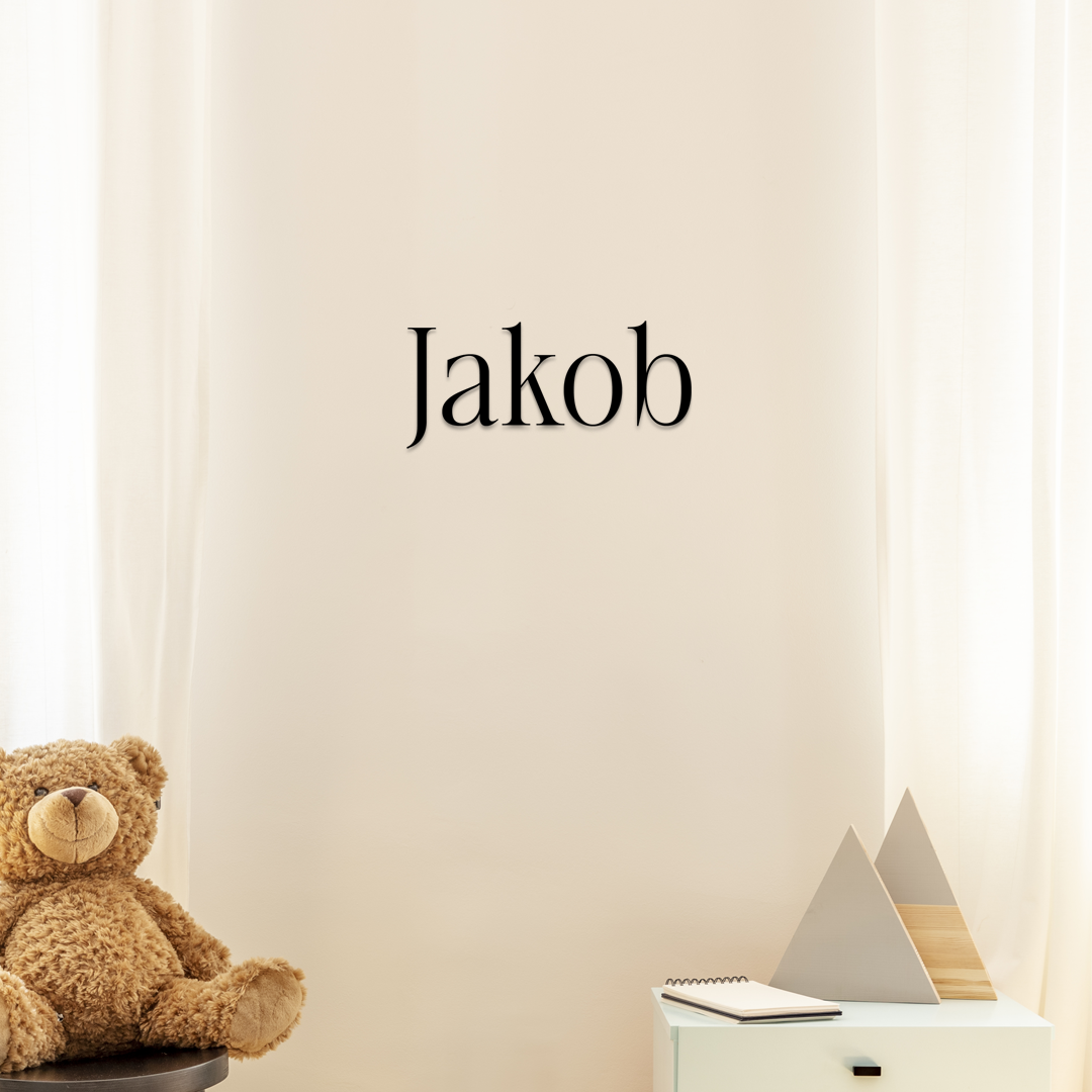 Teddy bear and decorative items on a shelf with 'Jakob' text on a plain background - Acrylic wall dekor - Vibewall