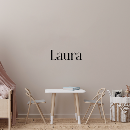 Children's room with a table and chairs, and a wall decal with the name 'Laura'. Acrylic wall dekor - Vibewall