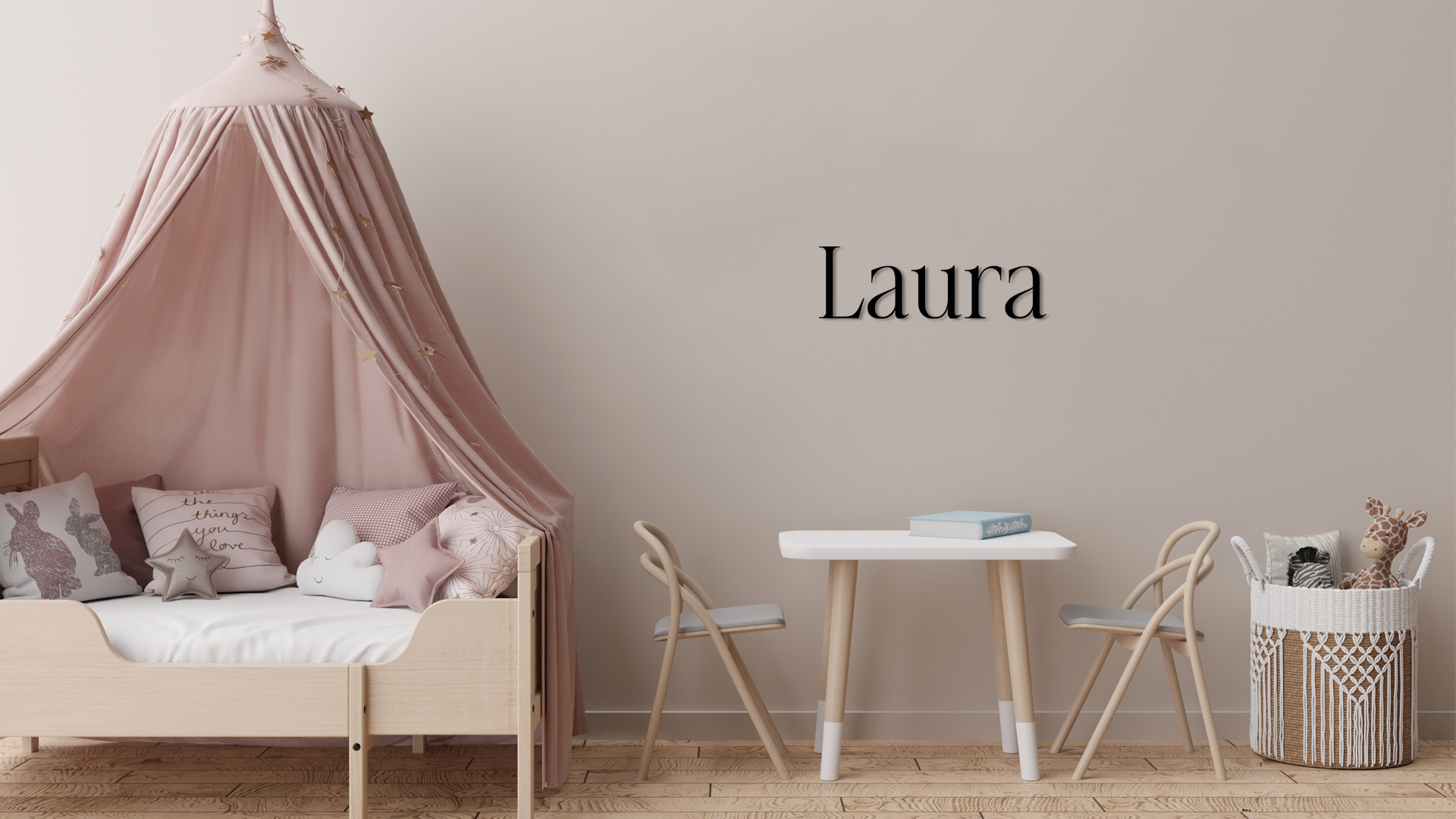 Children's room with a canopy bed, table, and chairs against a plain wall with 'Laura' text. Acrylic wall dekor - Vibewall