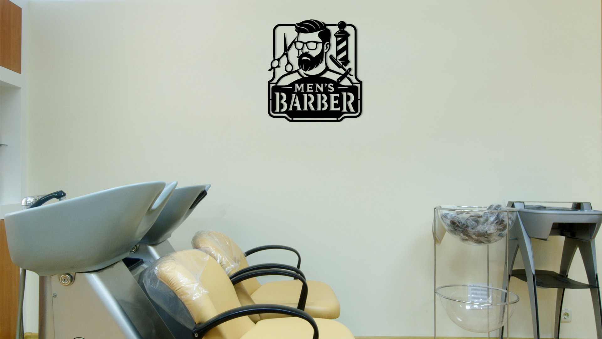Barber shop interior with sink, chair, and 'Men's Barber' logo on wall. Vibewall - Acrylic wall decor