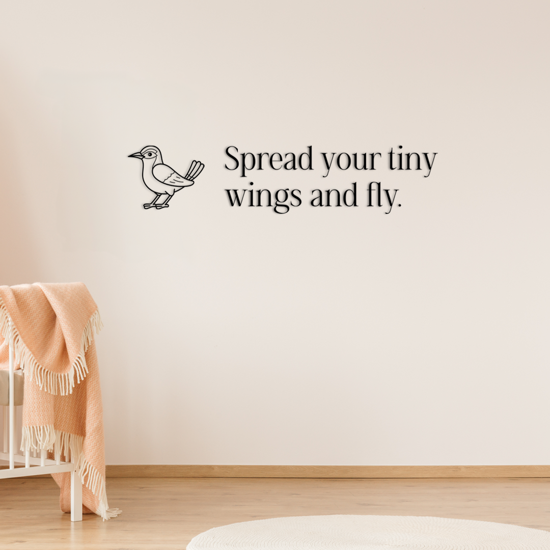 Uplifting wall decor featuring the illustration of a bird and encouraging phrase “Spread your tiny wings and fly,”. Acrylic glass decor - Vibewall