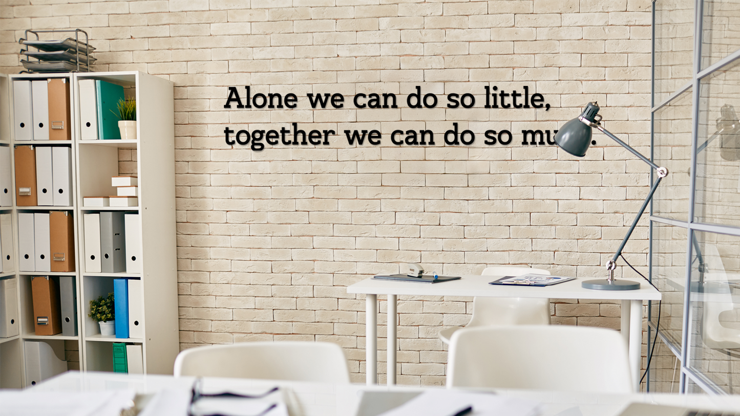 Office space with motivational quote on wall, shelves, and desk. Acrylic wall decor - Vibewall