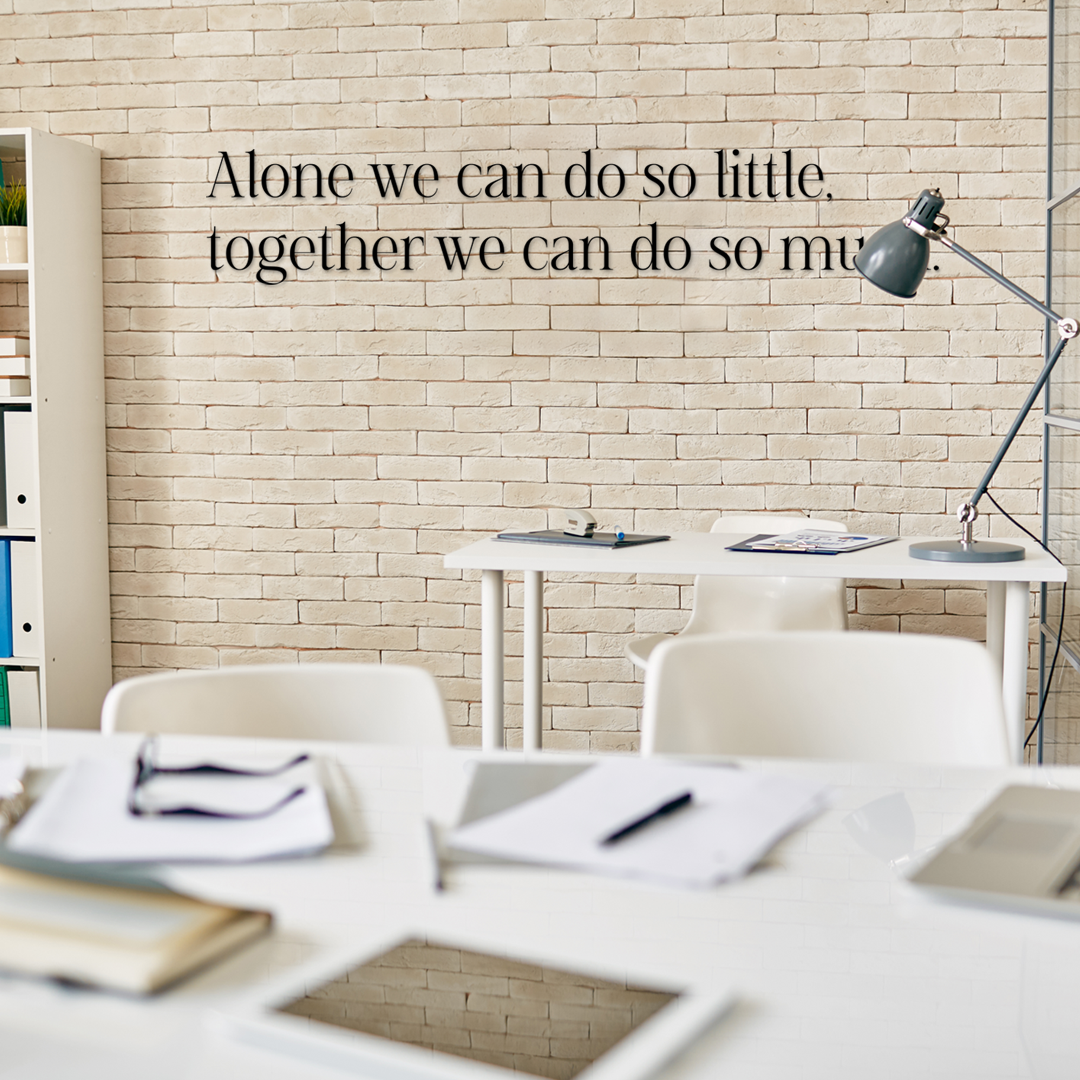 Office setting with motivational quote on wall, desk, and lamp. Acrylic wall decor - Vibewall