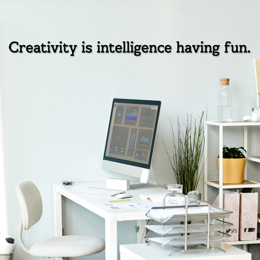 Modern office desk with computer and decor, featuring a motivational quote. Acrylic wall decor - Vibwall