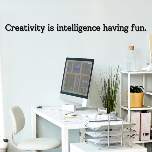 Modern office desk with computer and decor, featuring a motivational quote. Acrylic wall decor - Vibwall