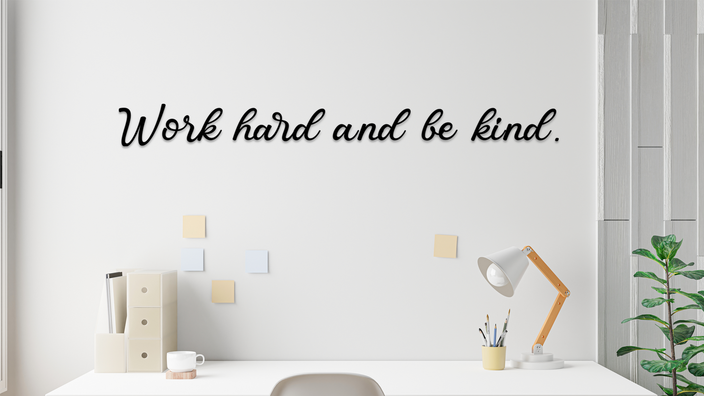 Motivational quote 'Work hard and be kind' on a white wall with a desk and decor. Acrylic wall decor - Vibewall