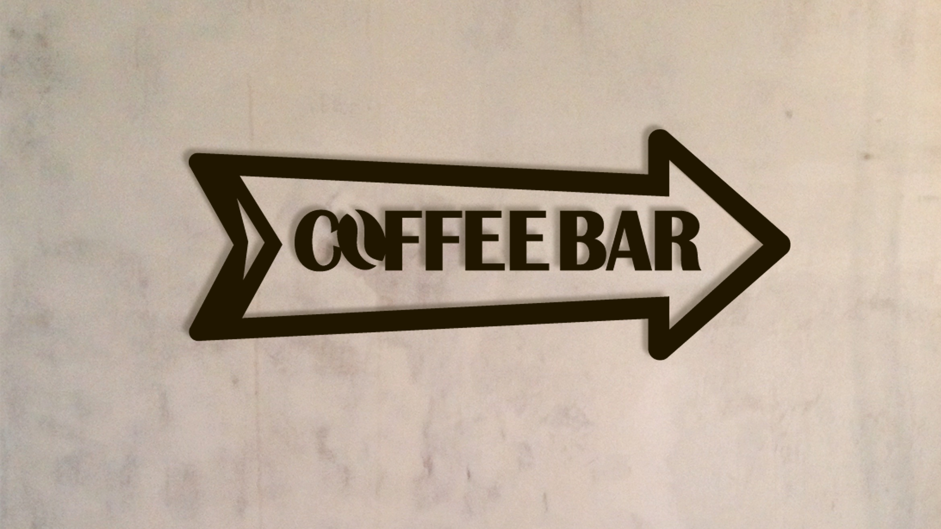 Black arrow-shaped sign with 'COFFEE BAR' text on a textured beige background - Acrylic wall decor - Vibewall 