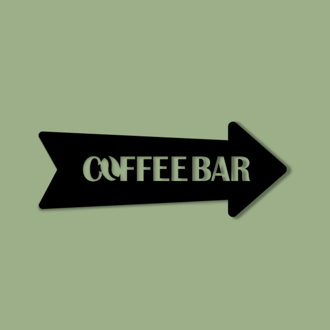 Black arrow-shaped sign with 'COFFEE BAR' text on a light green background - Acrylic wall decor - Vibewall 