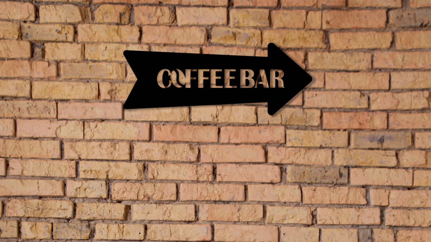 Black arrow sign pointing to a coffee bar on a brick wall. Acrylic wall decor - Vibewall