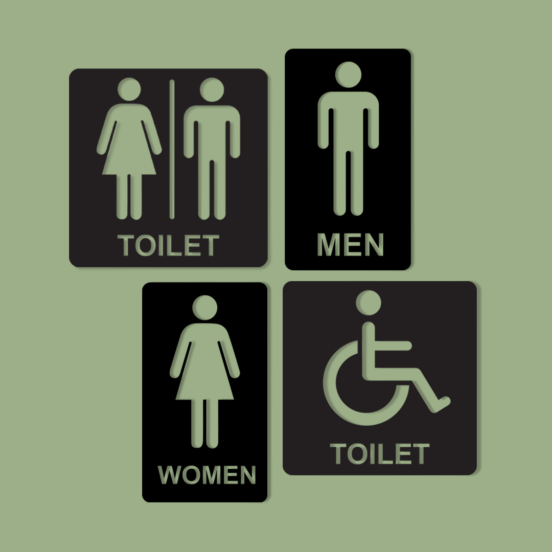 Set of four bathroom signs indicating men, women, and accessible toilets on a green background. Acrylic wall decor - Vibewall