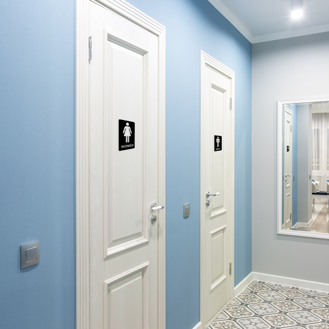 Two white doors in a hallway with blue walls and a mirror on the right. Acrylic glass wall decor - Vibewall