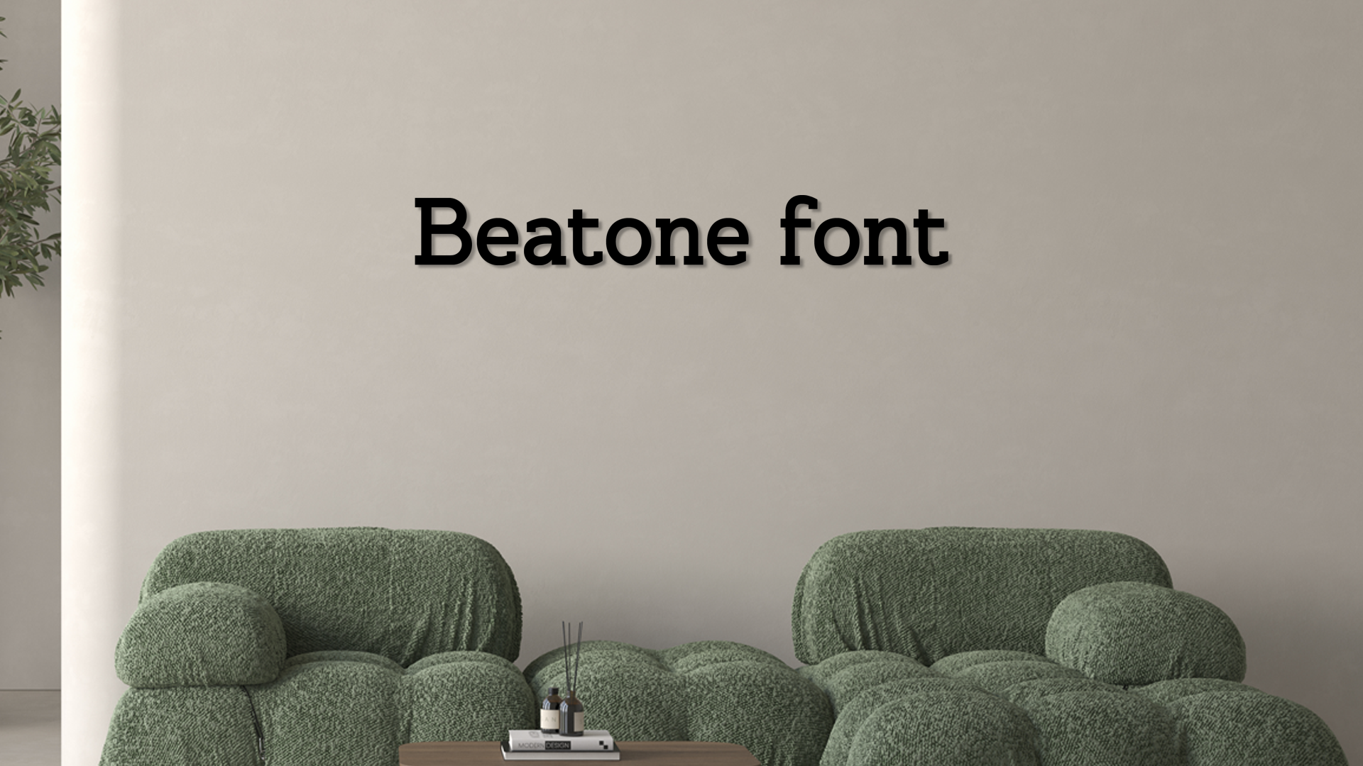 Green sofa with 'Beatone font' text on a beige wall
